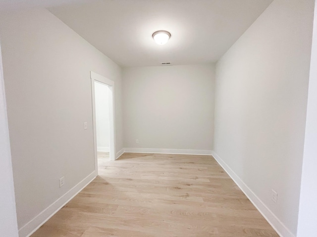 empty room with light wood-type flooring