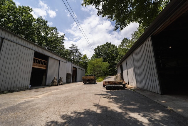 view of home's exterior featuring an outdoor structure