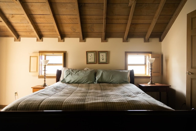 bedroom featuring wood ceiling and vaulted ceiling with beams