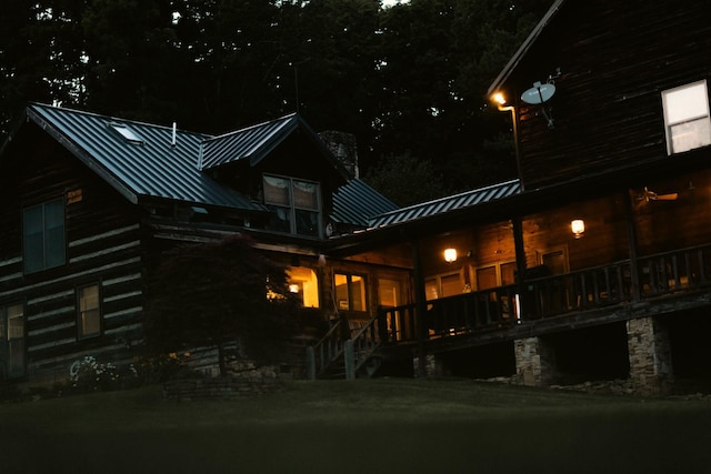 view of back house at night