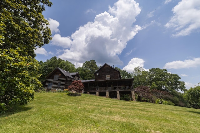 view of yard with a sunroom