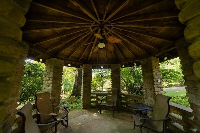 view of patio / terrace featuring ceiling fan and a gazebo