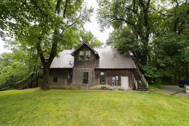 exterior space featuring a front lawn