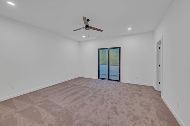 unfurnished room with ceiling fan, baseboards, carpet flooring, and recessed lighting