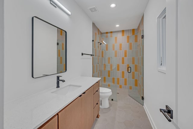 full bathroom featuring visible vents, toilet, tile patterned flooring, vanity, and a shower stall