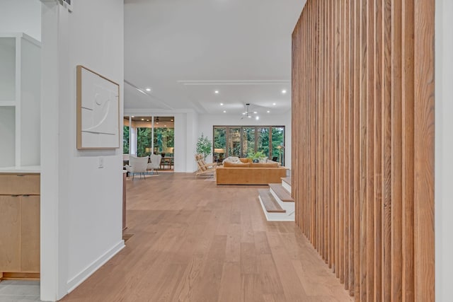 corridor with recessed lighting and light wood finished floors