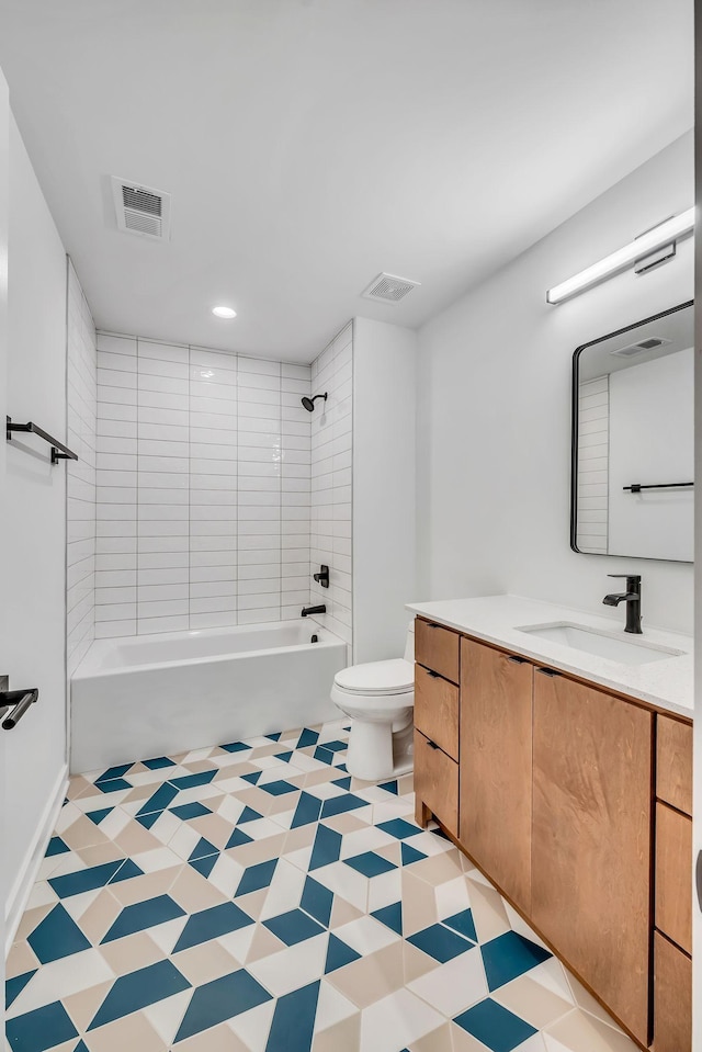 full bath featuring visible vents, shower / bathing tub combination, vanity, and toilet