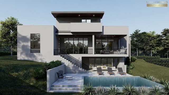 rear view of house featuring a yard, stucco siding, outdoor lounge area, stairway, and a patio area