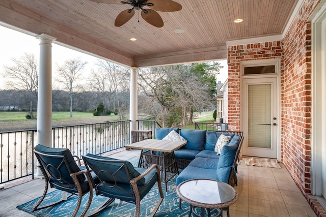 view of patio / terrace featuring ceiling fan