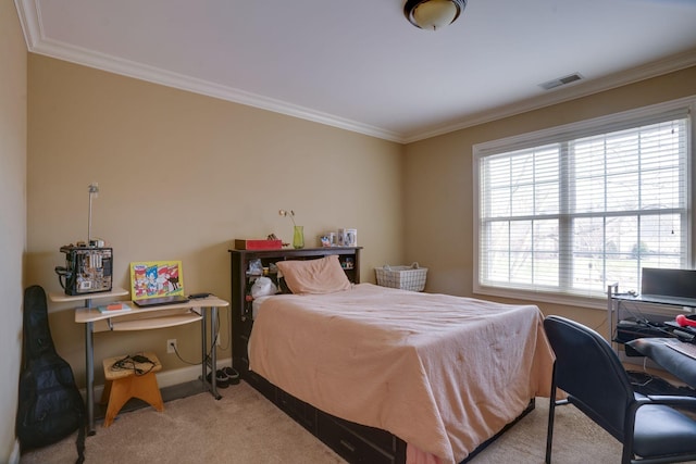 carpeted bedroom with ornamental molding