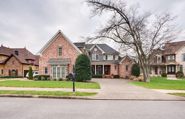 view of front of home with a front lawn