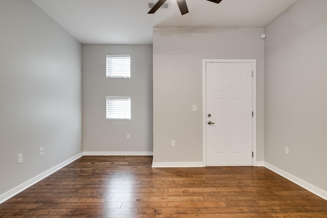 empty room featuring ceiling fan and wood-type flooring