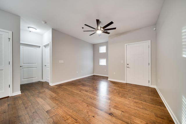 unfurnished room with ceiling fan and hardwood / wood-style flooring