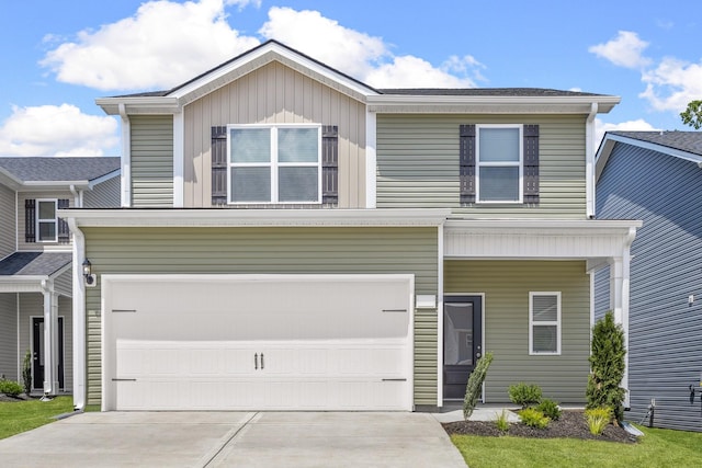 view of front of property with a garage