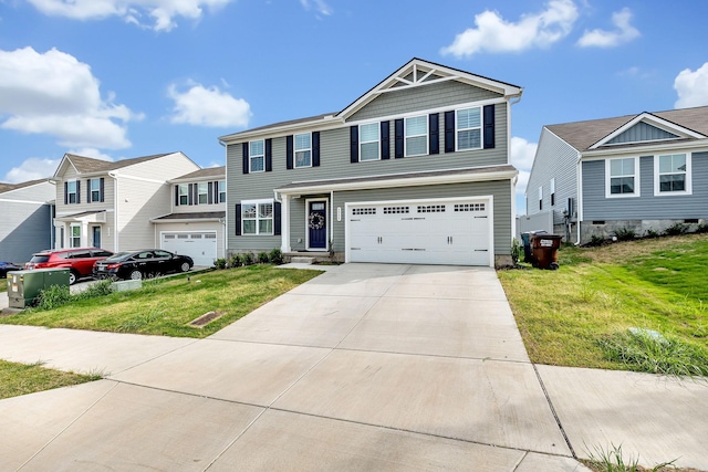 view of front of home with a garage and a front yard