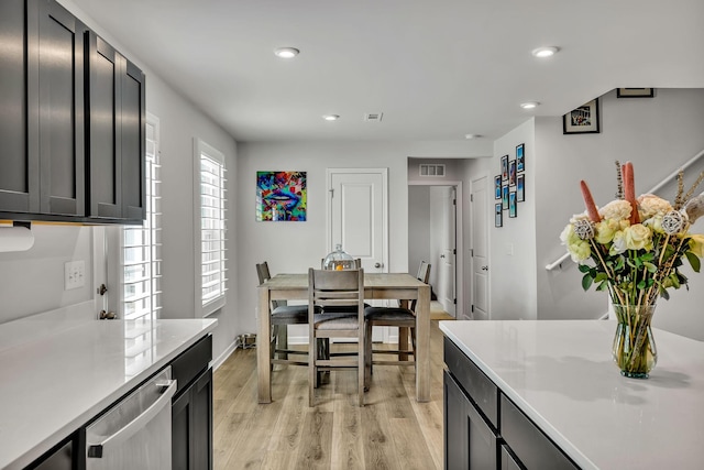 interior space featuring dishwasher and light wood-type flooring