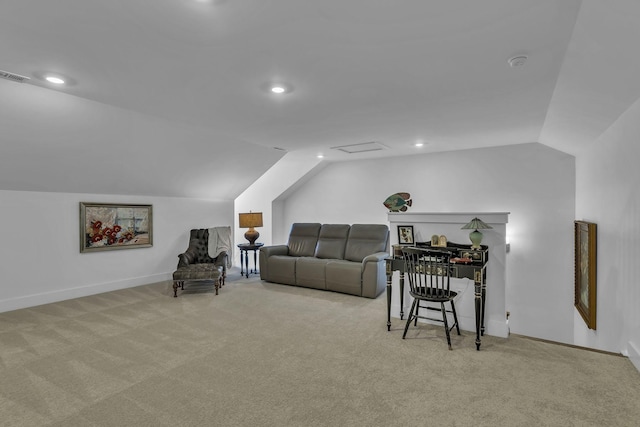 carpeted living room featuring vaulted ceiling