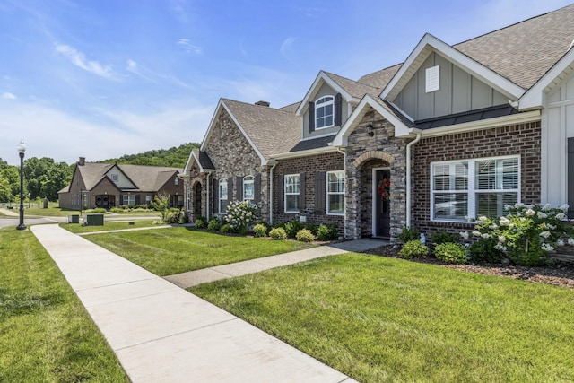 view of front of property with a front lawn