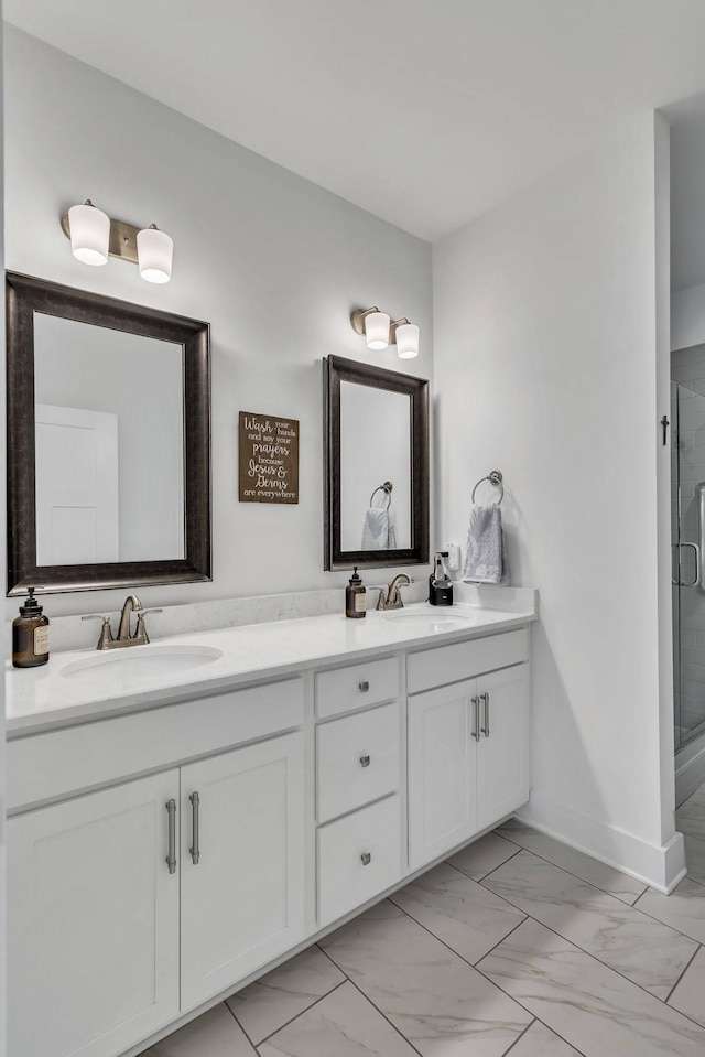 bathroom with walk in shower and vanity