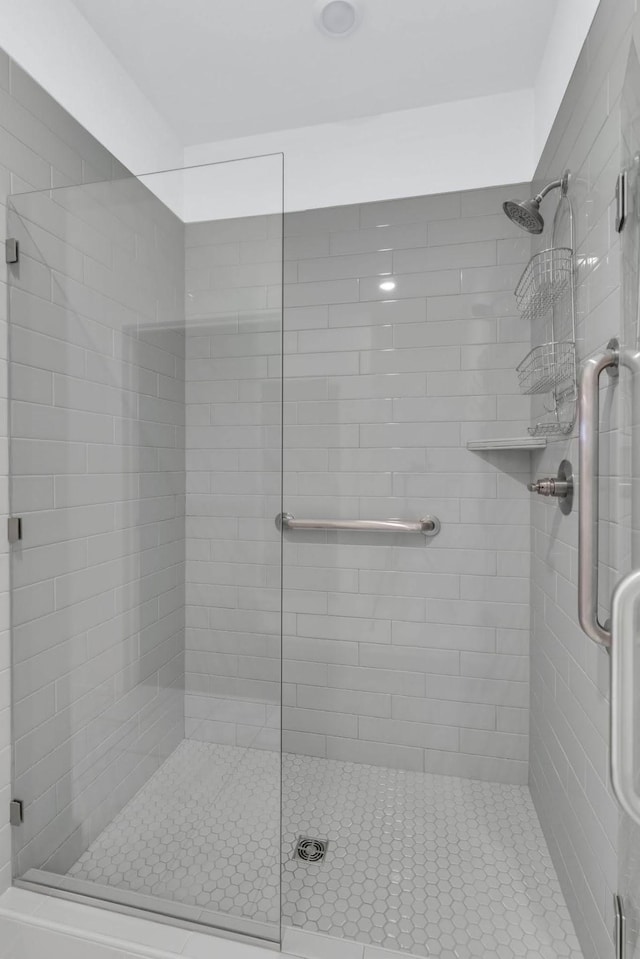 bathroom featuring an enclosed shower