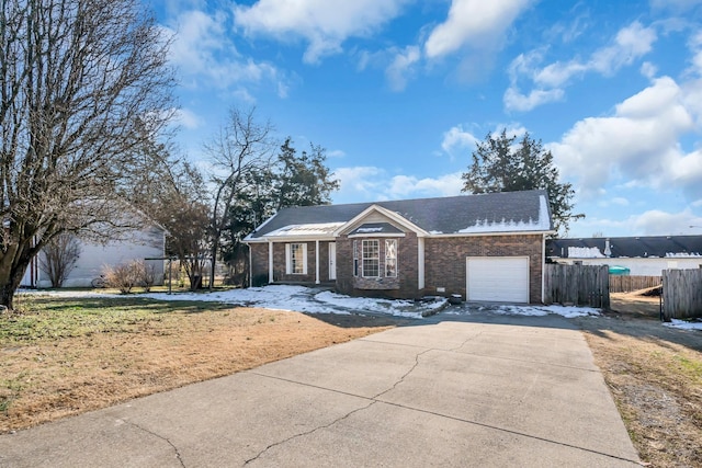 single story home featuring a garage