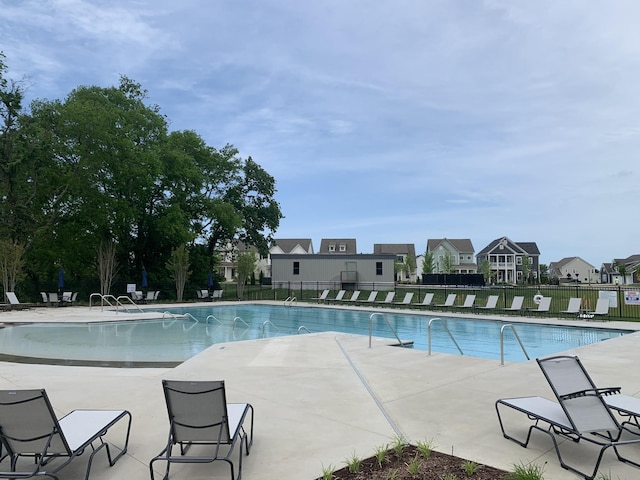 view of pool featuring a patio