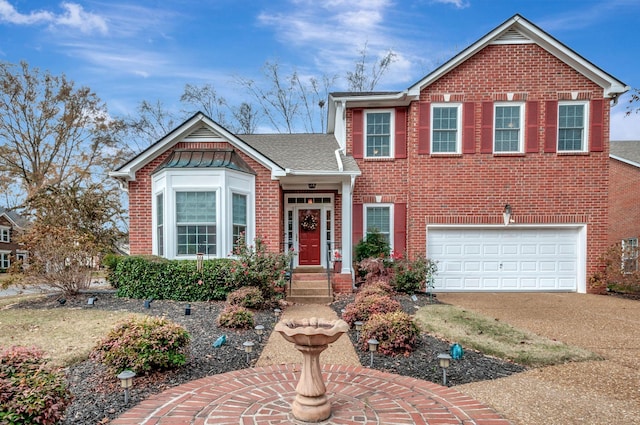 view of front of property with a garage