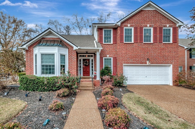 view of front of property featuring a garage