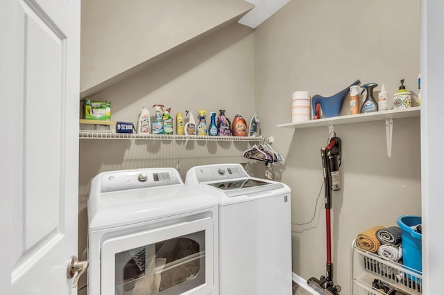 clothes washing area with independent washer and dryer