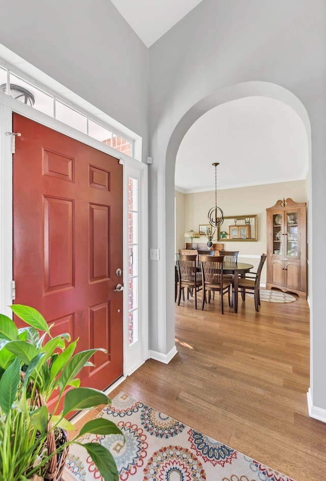 entryway with wood-type flooring