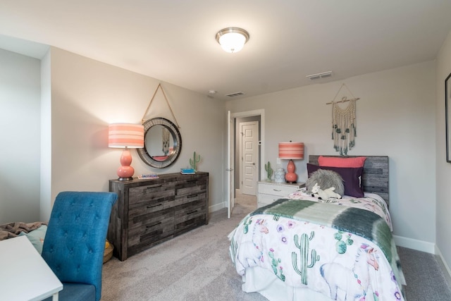 bedroom featuring light colored carpet