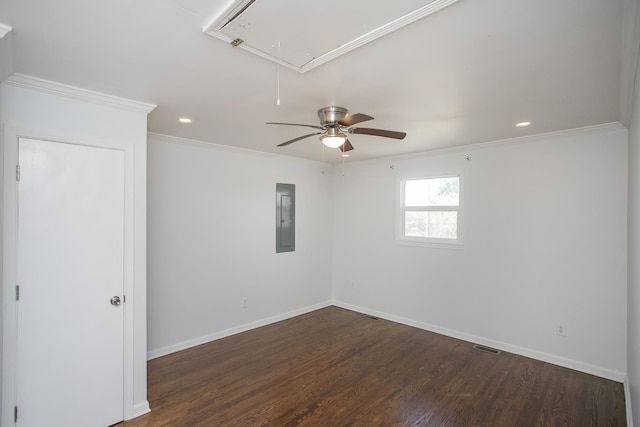 spare room with crown molding, ceiling fan, dark hardwood / wood-style flooring, and electric panel