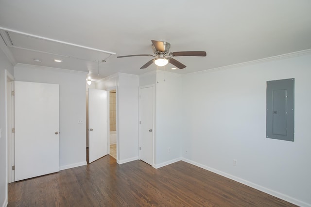 unfurnished room featuring ceiling fan, ornamental molding, dark hardwood / wood-style floors, and electric panel