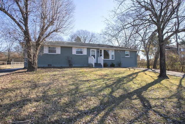 single story home with a front lawn