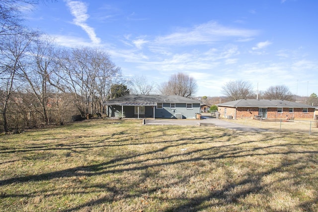 exterior space featuring a front lawn