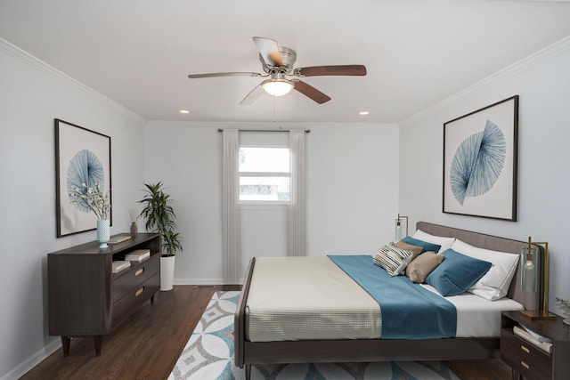 bedroom with ornamental molding, dark hardwood / wood-style floors, and ceiling fan