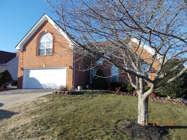 view of front property with a front yard and a garage