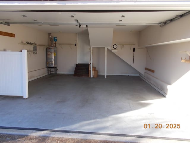 garage featuring gas water heater