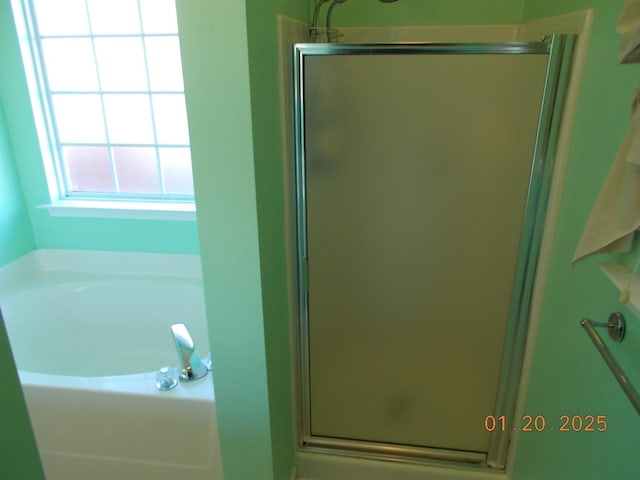 bathroom with plus walk in shower