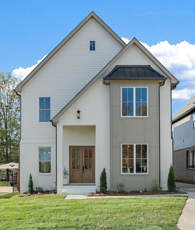 view of front facade with a front lawn