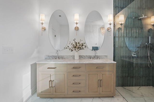 bathroom featuring vanity and a shower