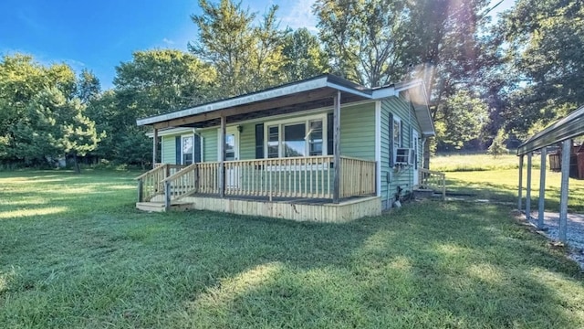 3352 Dumor Deer Lick Rd, Lewisburg, KY 42256 - view of front of property with a front lawn, cooling unit, and a porch