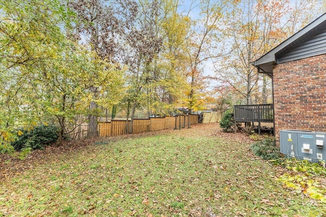 view of yard with a deck