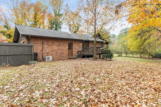 rear view of house with a deck