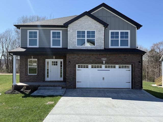 view of front of property featuring a front lawn, board and batten siding, concrete driveway, a garage, and brick siding