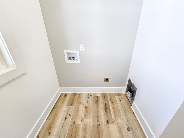 laundry room featuring hardwood / wood-style floors, hookup for a washing machine, and electric dryer hookup