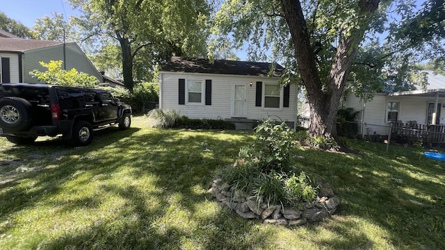 view of front of home with a front lawn