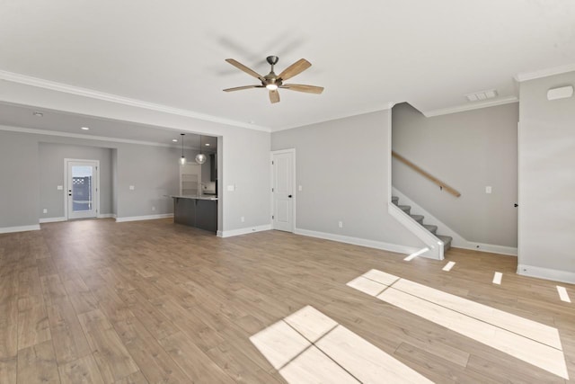 unfurnished living room with ceiling fan, crown molding, and light hardwood / wood-style flooring