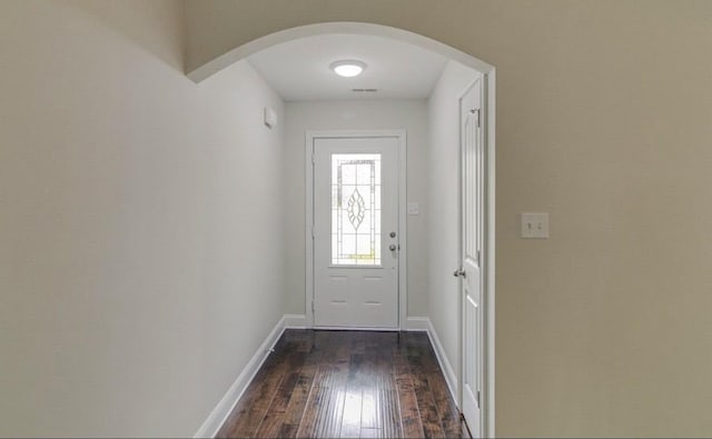 entryway with dark hardwood / wood-style floors