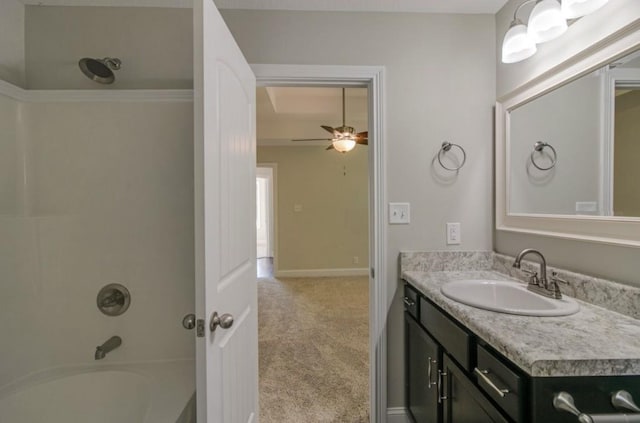 bathroom with ceiling fan, vanity, and shower / bathtub combination